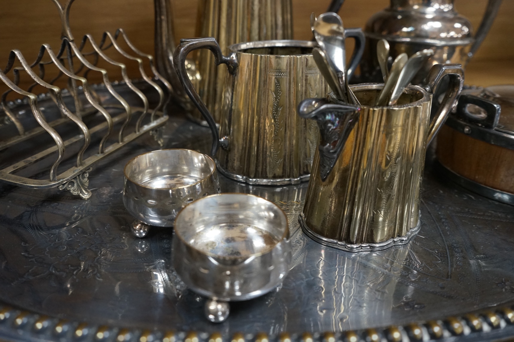 A collection of Victorian plated wares to include a pair of Corinthian column candelabra, 54cm